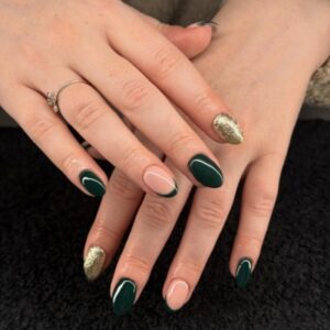 Green and gold festive winter nails created at La Suite nail salon Corbridge