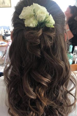 HAIRSTYLES WITH FLOWER ACCESSORIES AT LA SUITE HAIR & BEAUTY SALON IN CORBRIDGE